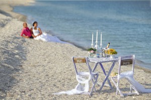 Virtual Honeymoon - Couple resting on the beach
